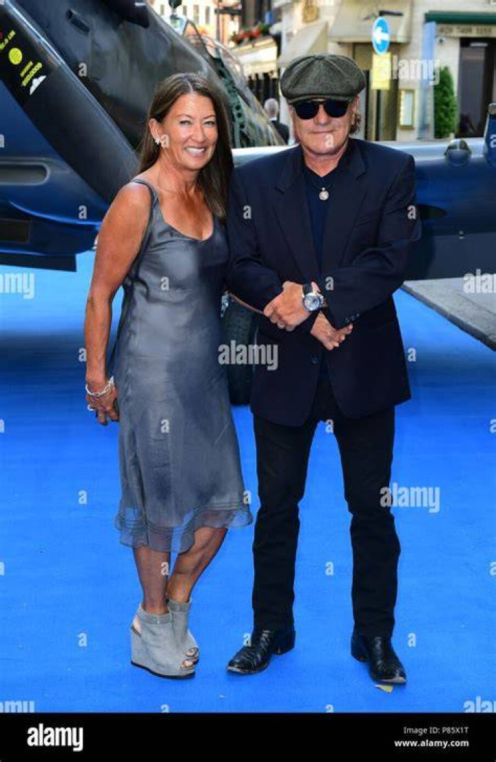 Brenda Johnson and Brian Johnson attending the premiere of Spitfire